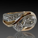 Anillo vintage irregular en oro y plata con circonita