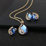 Conjunto de Collar y Pendientes en Cristal Azul con Dorado