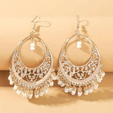 Pendientes Mandala con Cuentas Blancas Atemporales