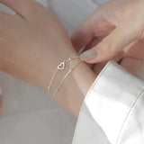 Pulsera ajustable con corazón de plata