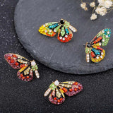 Pendientes de Pino de Mariposa con Zircónias Coloridas