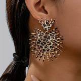 Pendientes Espina dorsal de oro negro
