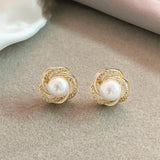 Pendientes Elegantes de Oro con Perlas en Espiral y Zircónias