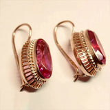Pendientes de Oro Rosa con Piedras Rojas