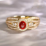 Anillo Dorado en Capas con Brillo Rojo