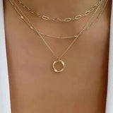 Collar Vintage con Cadena en Capas y Colgante Dorado